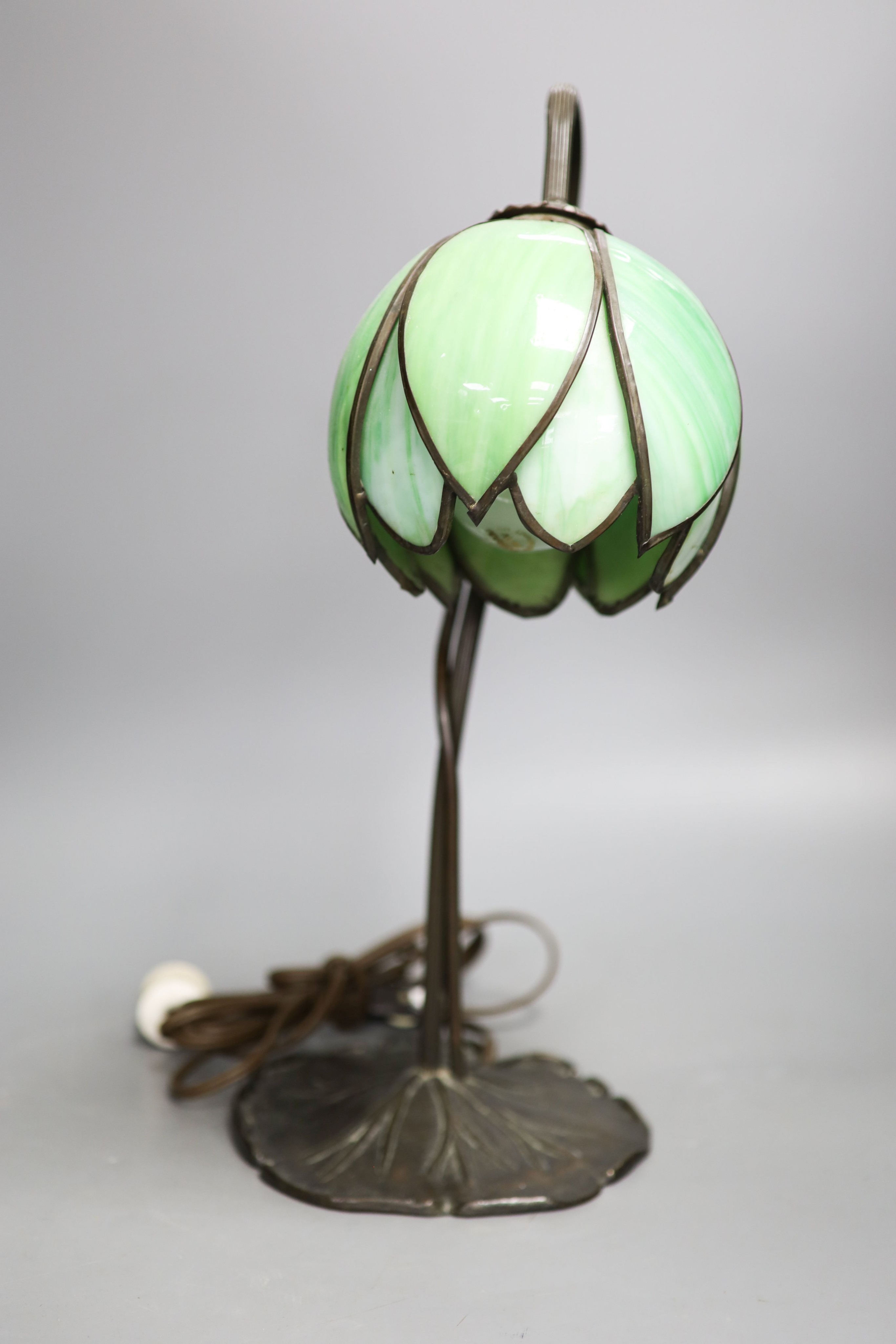 A Tiffany style metal and glass lamp 43cm